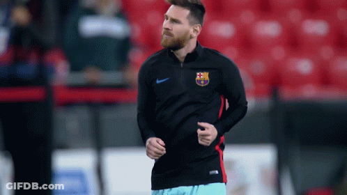 A Man With A Beard Is Running On A Field GIF