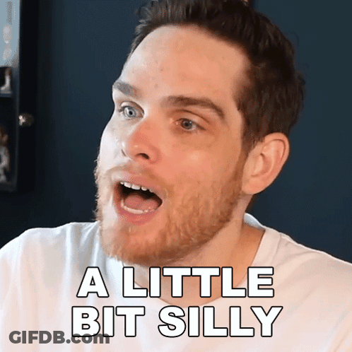 A Man With A Beard Is Saying A Little Bit Silly With His Mouth Open GIF