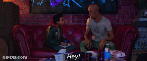 A Man With A Beard Is Saying Hey In A Cartoon GIF