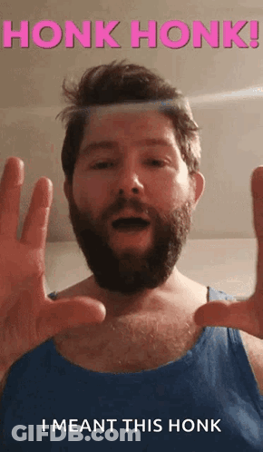 A Man With A Beard Is Saying Honk Honk GIF