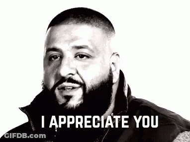 A Man With A Beard Is Saying `` I Appreciate You '' In A Black And White Photo . GIF