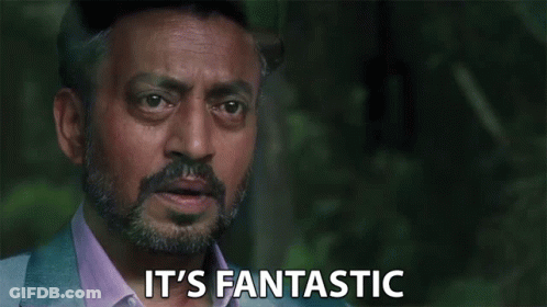 A Man With A Beard Is Saying `` It 'S Fantastic '' While Looking At The Camera . GIF