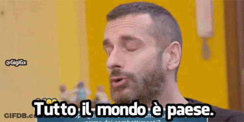 A Man With A Beard Is Saying Tutto Il Mondo E Paese GIF