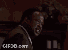 A Man With A Beard Is Screaming And The Words Shhhhiiiiiiiii Are On A Black Background GIF