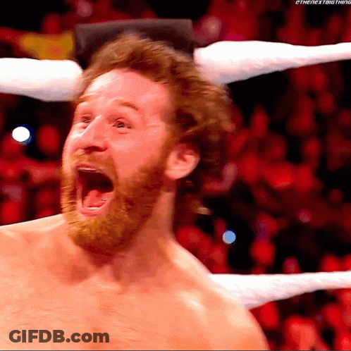 A Man With A Beard Is Screaming In A Wrestling Ring GIF