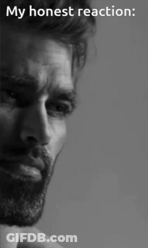 A Man With A Beard Is Shown In A Black And White Photo With The Caption " My Honest Reaction " GIF