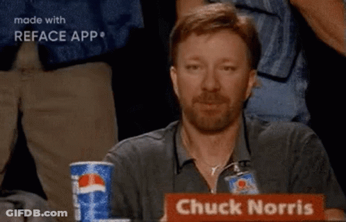 A Man With A Beard Is Sitting At A Table With A Pepsi Can In Front Of Him . GIF