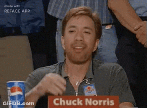 A Man With A Beard Is Sitting At A Table With A Pepsi Can In Front Of Him . GIF