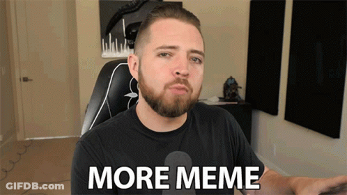 A Man With A Beard Is Sitting In A Chair And Saying More Meme GIF