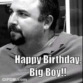 A Man With A Beard Is Sitting In A Chair And Says Happy Birthday Big Boy GIF