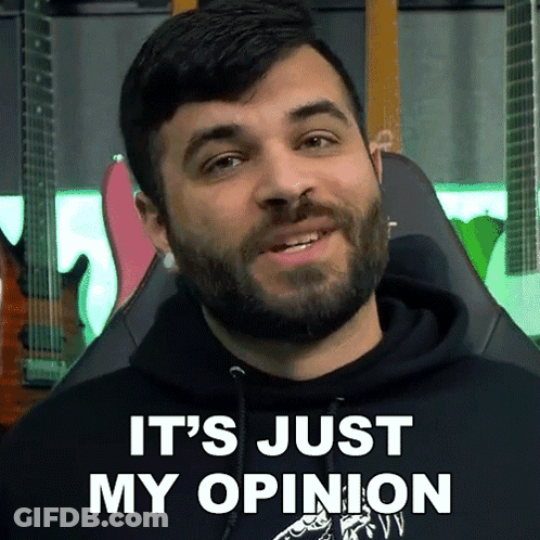 A Man With A Beard Is Sitting In A Chair And Says It 'S Just My Opinion GIF