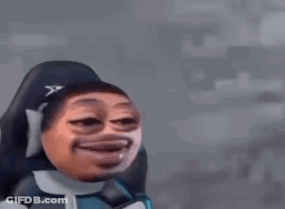 A Man With A Beard Is Sitting In A Chair With His Mouth Open And Making A Funny Face . GIF