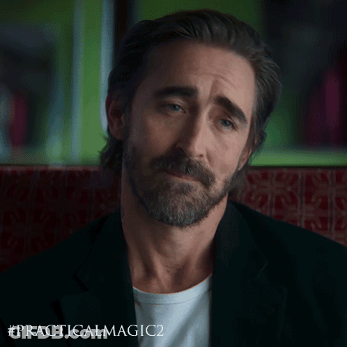 A Man With A Beard Is Sitting In A Chair With The Hashtag #Practicalmagic2 GIF