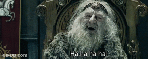 A Man With A Beard Is Sitting In A Chair With The Words Ha Ha Ha Ha Written Below Him GIF