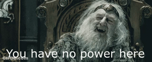A Man With A Beard Is Sitting In A Chair With The Words " You Have No Power Here " Above Him GIF