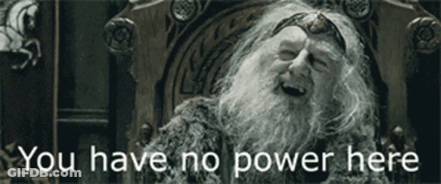 A Man With A Beard Is Sitting In A Chair With The Words " You Have No Power Here " Written Below Him GIF