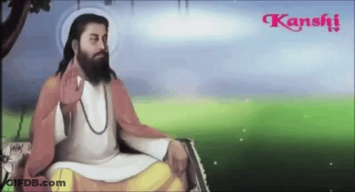 A Man With A Beard Is Sitting In A Field With Kanshi Written In The Corner GIF