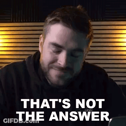 A Man With A Beard Is Sitting In Front Of A Laptop Computer And Says `` That 'S Not The Answer '' . GIF