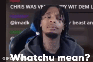 Man With Beard Sitting In Front Of Whatchu Mean Screen GIF