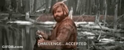 A Man With A Beard Is Sitting In The Woods Holding A Fishing Rod . GIF