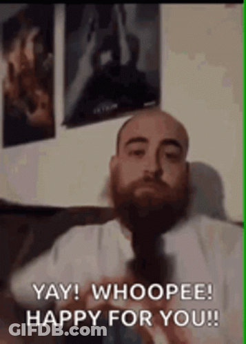A Man With A Beard Is Sitting On A Couch And Saying `` Yay ! Whoopee ! Happy For You !! '' GIF