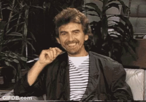 A Man With A Beard Is Sitting On A Couch And Says It 'S George Harrison ... Remember Me ? GIF