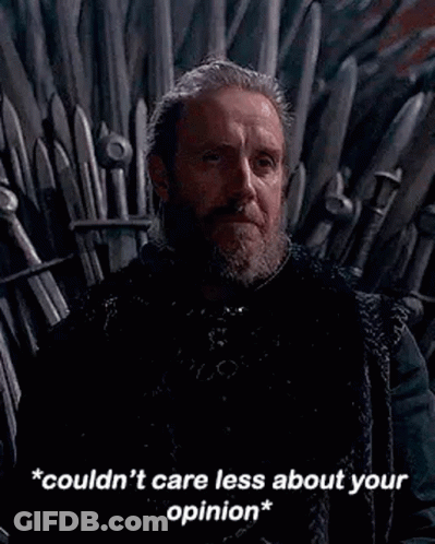 A Man With A Beard Is Sitting On A Throne With A Sword In His Hand . GIF