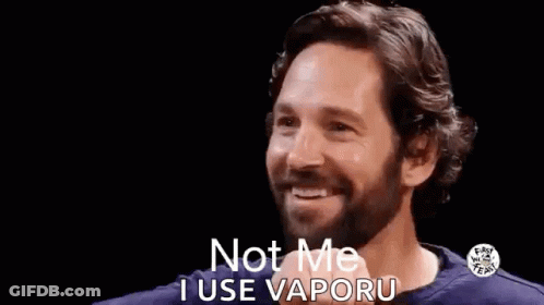 A Man With A Beard Is Smiling And Saying Not Me I Use Vaporu GIF