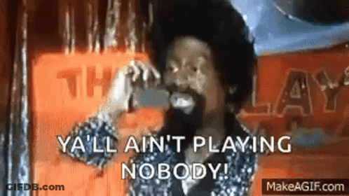 A Man With A Beard Is Smiling And Saying `` Ya 'Ll Ain 'T Playing Nobody '' . GIF