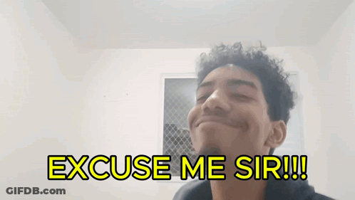 A Man With A Beard Is Smiling And Says Excuse Me Sir GIF