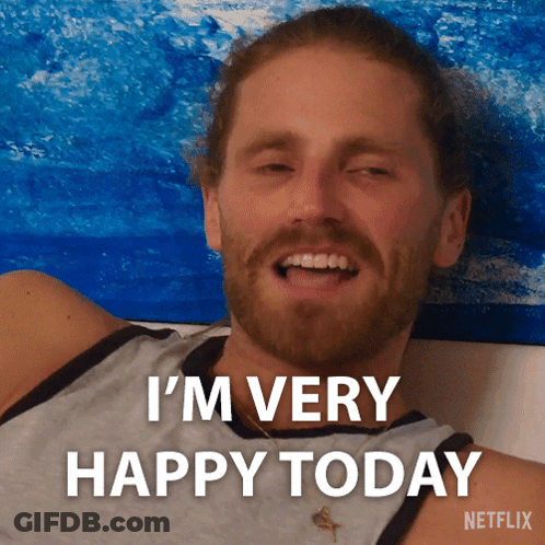 A Man With A Beard Is Smiling And Says I 'M Very Happy Today Netflix GIF