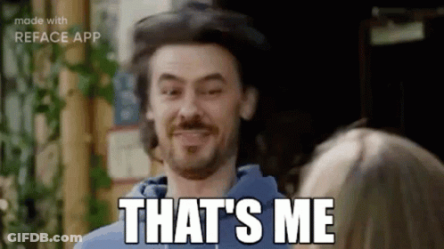 A Man With A Beard Is Smiling And Says `` That 'S Me '' . GIF
