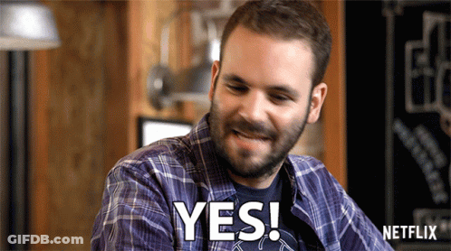 Bearded Man Smiling And Saying Yes GIF