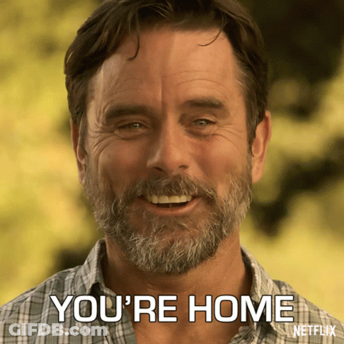 A Man With A Beard Is Smiling And Says You 'Re Home Netflix GIF