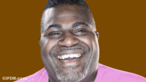 A Man With A Beard Is Smiling In Front Of A Colorful Sign That Says Bubbly GIF