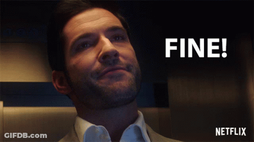A Man With A Beard Is Smiling In Front Of A Sign That Says Fine On It GIF