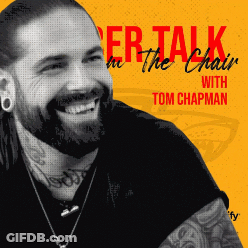 A Man With A Beard Is Smiling On The Cover Of A Book Called Talk In The Chair With Tom Chapman GIF