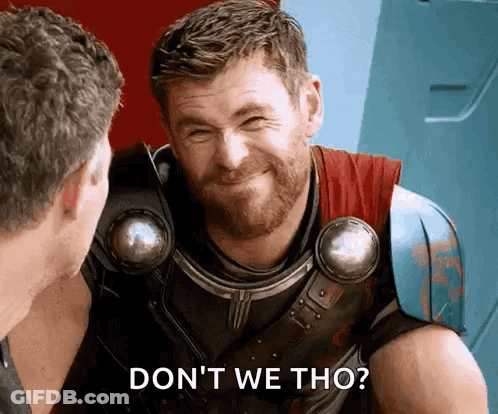 A Man With A Beard Is Smiling While Talking To Another Man And Says `` Do N't We Tho '' . GIF