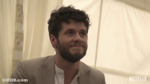 Man Smiling With Netflix Logo GIF