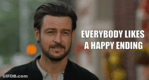 A Man With A Beard Is Smiling With The Words Everybody Likes A Happy Ending Below Him GIF