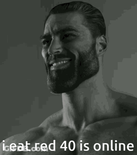 A Man With A Beard Is Smiling With The Words I Eat Red 40 Is Online GIF