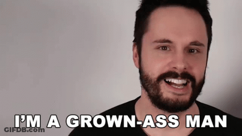 A Man With A Beard Is Smiling With The Words I 'M A Grown-Ass Man Below Him GIF