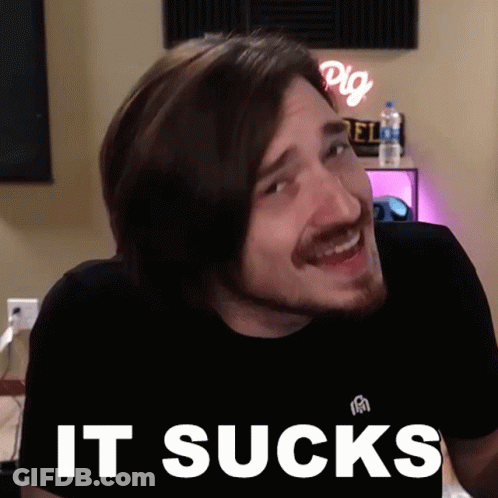Bearded Man Smiling With It Sucks Text GIF