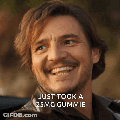 A Man With A Beard Is Smiling With The Words Just Took A 25Mg Gummie Next To Him GIF