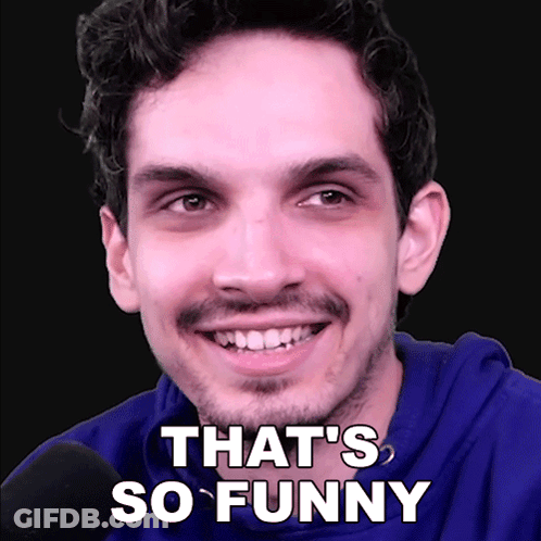 A Man With A Beard Is Smiling With The Words That 'S So Funny On His Face GIF