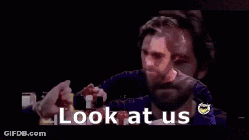 A Man With A Beard Is Smiling With The Words `` Who Woulda Thought '' Behind Him . GIF