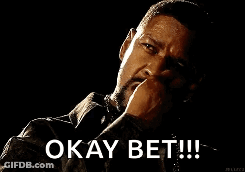 A Man With A Beard Is Smoking A Cigarette And Saying `` Okay Bet ! '' GIF