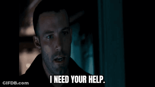 A Man With A Beard Is Standing In A Dark Room With His Eyes Closed And A Quote From A Movie . GIF
