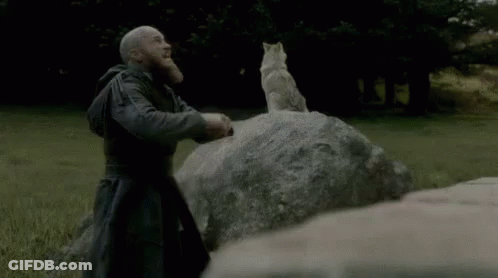 Man With Beard Standing In Field Shouting GIF