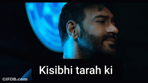 A Man With A Beard Is Standing In Front Of A Blue Background With The Words Kisibi Tarah Ki GIF